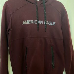 Men’s dark red American Eagle sweatshirt, size xs.